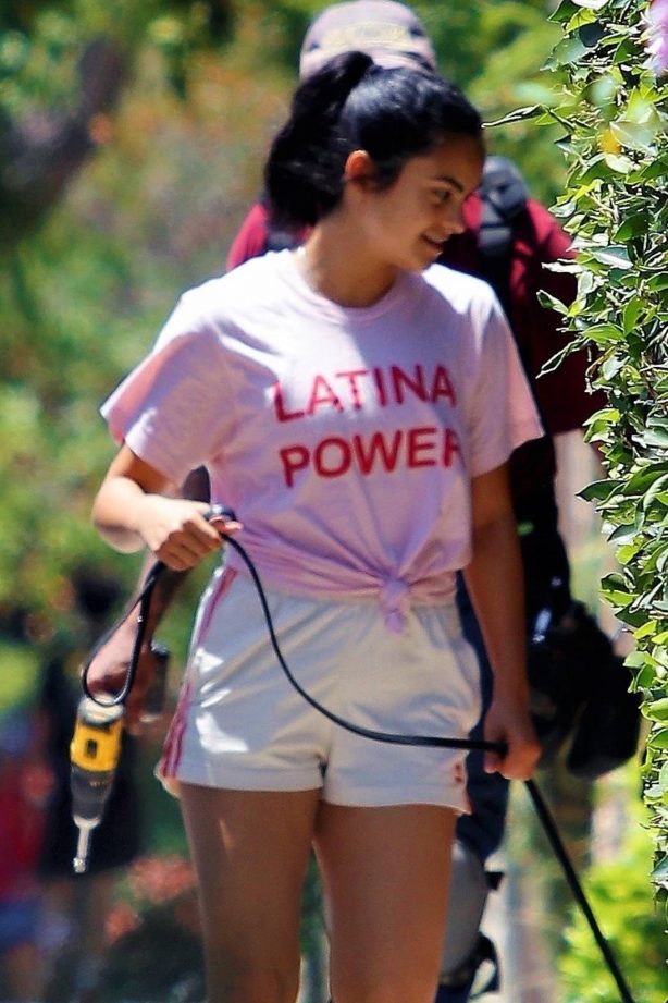 Camila Mendes - Looks sporty while takes her pooch for a stroll in Los Angeles