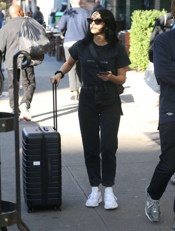Camila Mendes - Out with luggage in NY