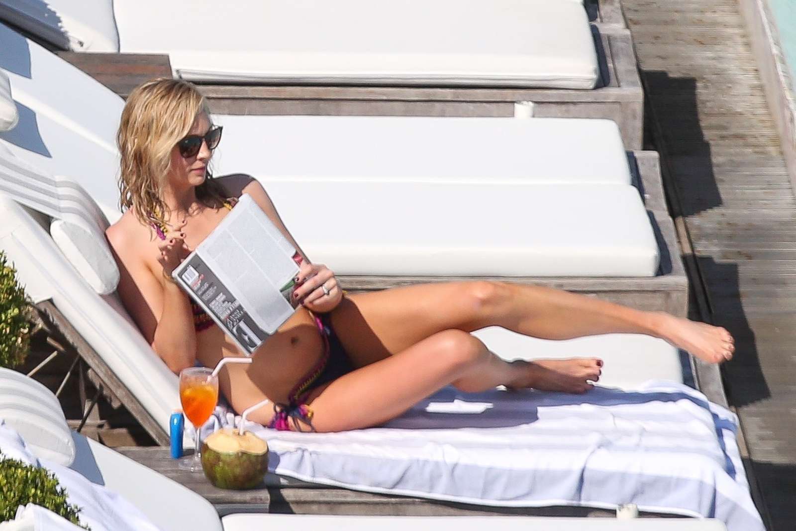 Candice Accola in Bikini at a pool in Rio. 