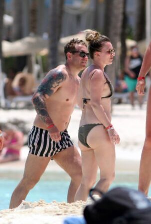 Candice Brown - In a bikini Hits the beach in Cancun