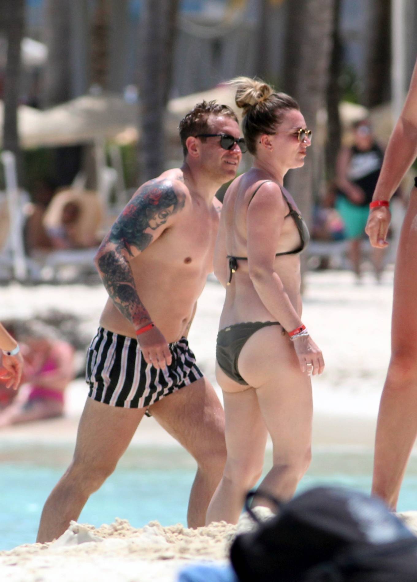 Candice Brown - In a bikini Hits the beach in Cancun