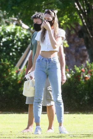 Candice Swanepoel - In denim spotted at a Park in Miami