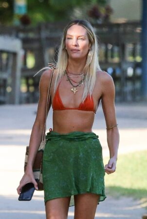 Candice Swanepoel - Seen in orange bikini on vacation in Trancoso