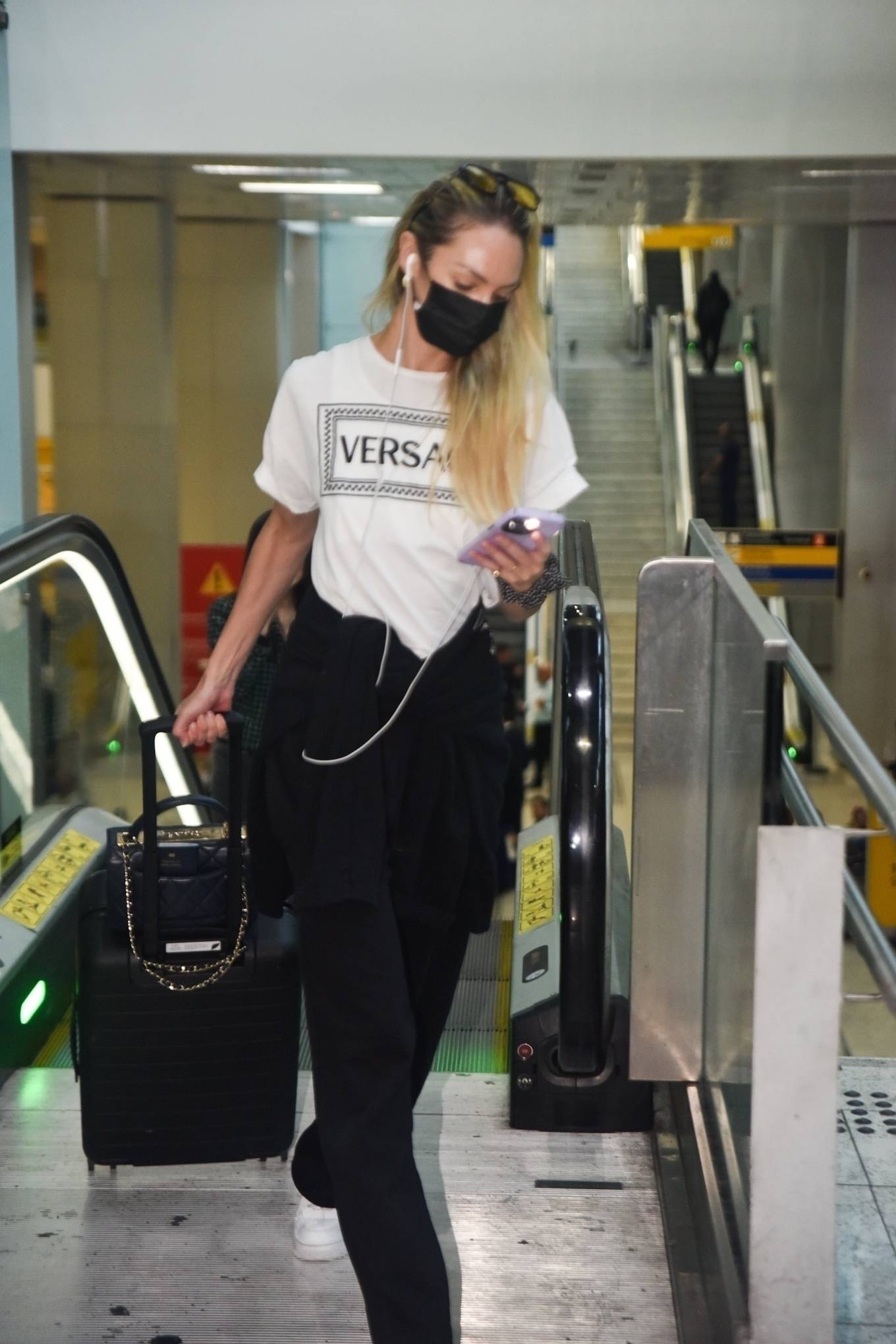 Candice Swanepoel 2023 : Candice Swanepoel – Seen in Versace as she touches down at Guarulhos airport in São Paulo-13