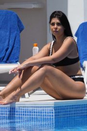 Cara De La Hoyde in Black Bikini at a pool in Tenerife