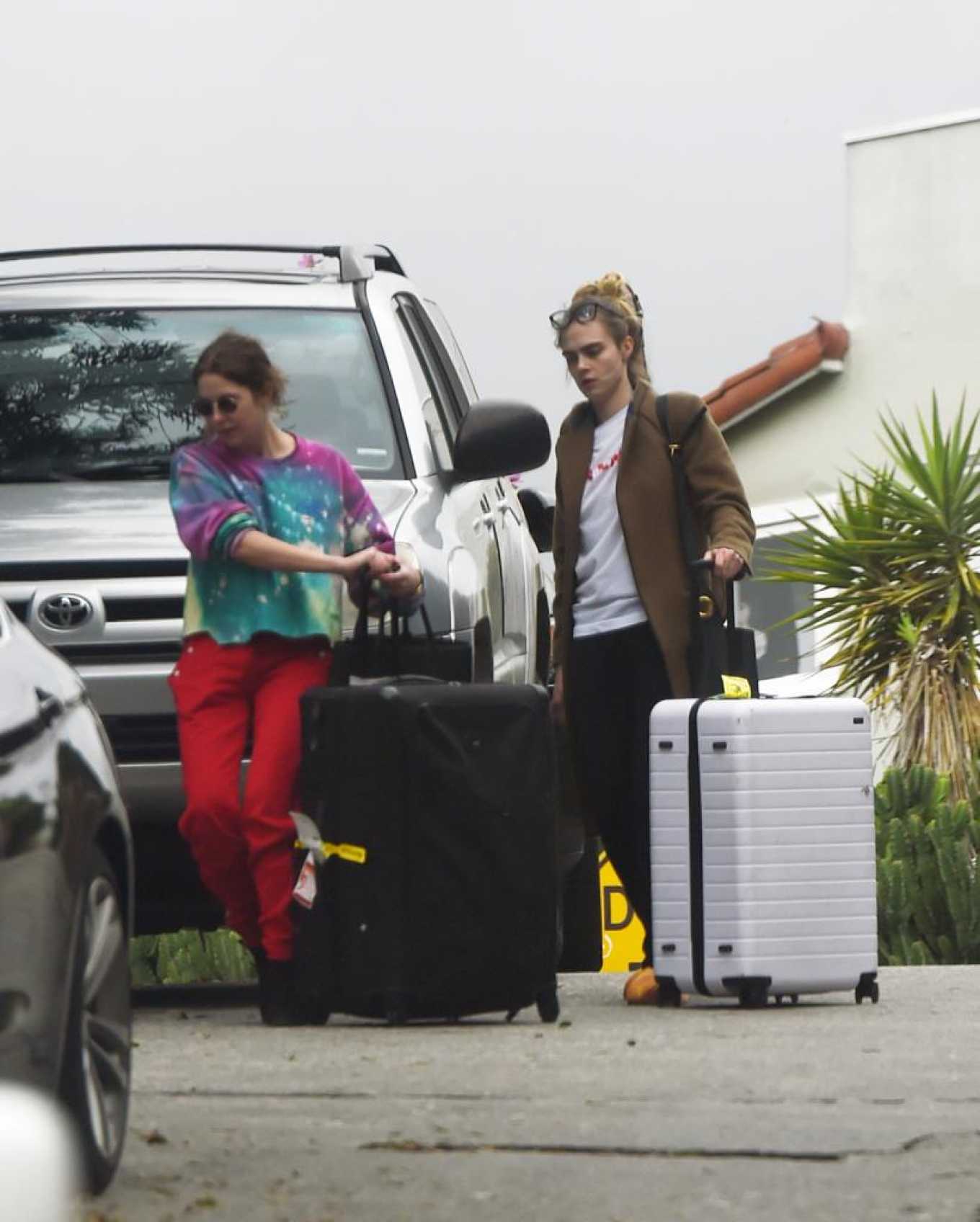 Cara Delevingne and Ashley Benson â€“ Heading out with luggage in Los Angeles