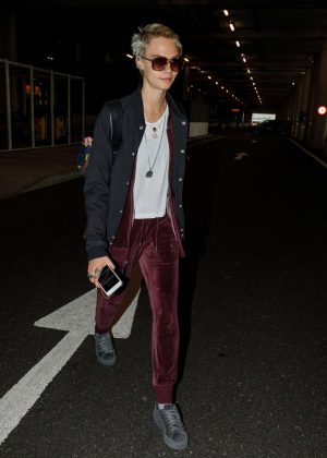 Cara Delevingne - Arrives at Heathrow Airport in London