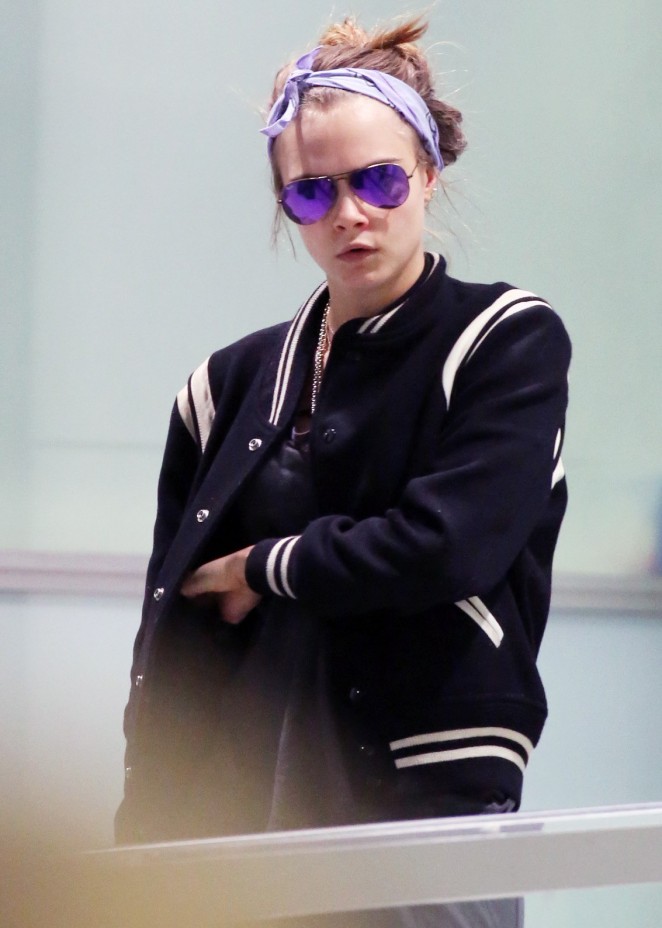 Cara Delevingne at an airport in Sydney