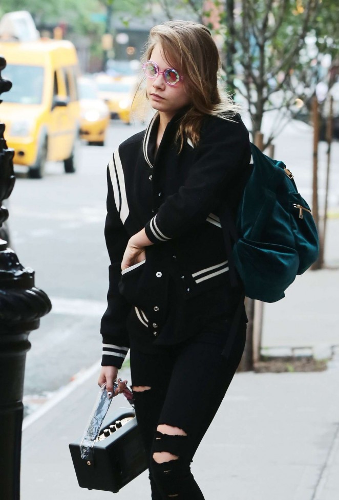 Cara Delevingne in Ripped Jeans Leaving the Hotel in NYC