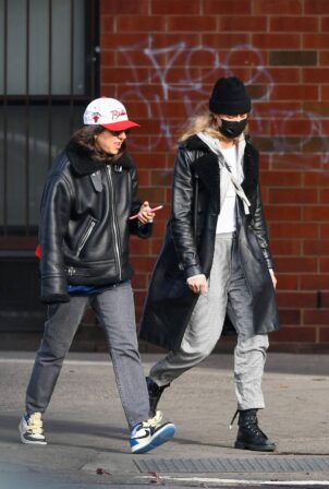 Cara Delevingne - Steps out with a friend in New York