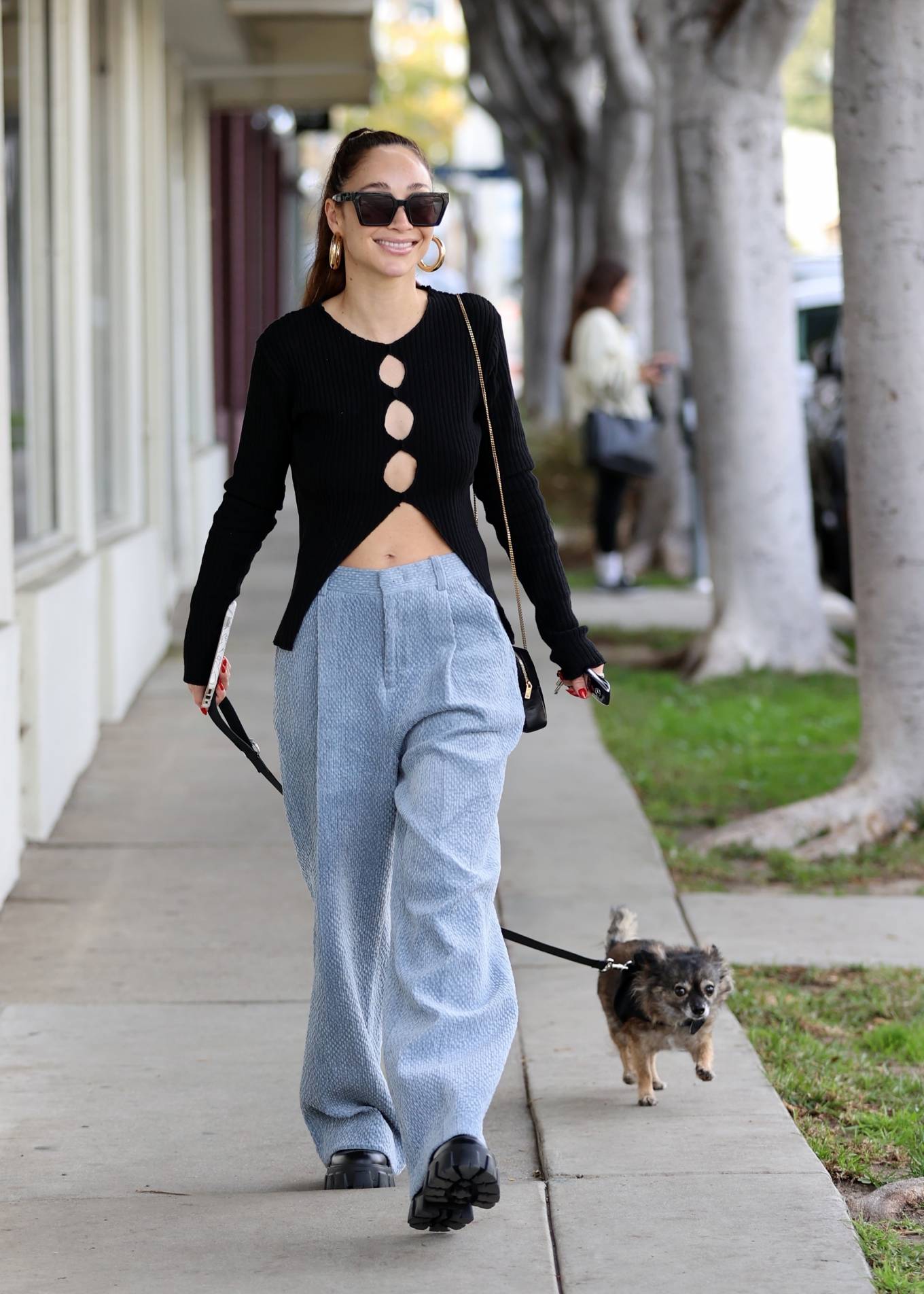 Cara Santana - Heading to a hair salon with her adorable dog in Los Angeles