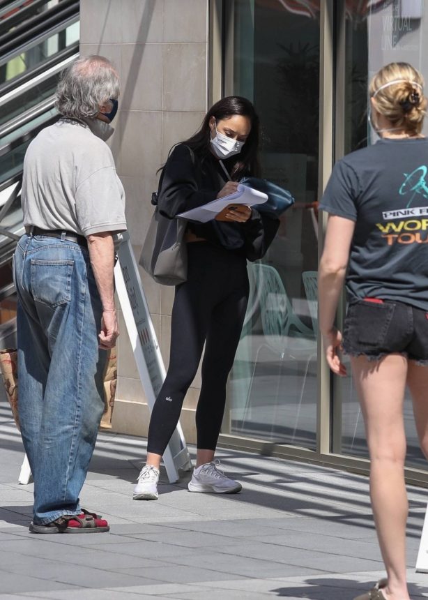 Cara Santana - In black leggings while out getting a COVID test in Los Angeles