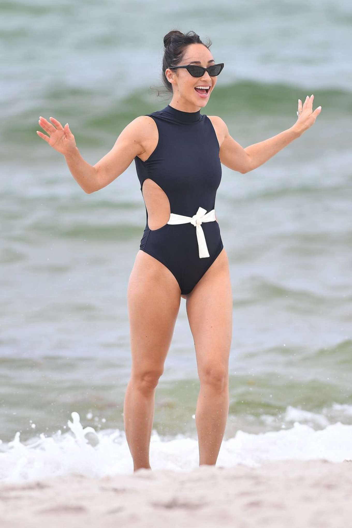 Cara Santana in Black Swimsuit at the beach in Miami