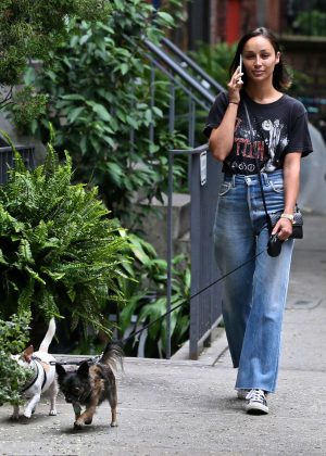 Cara Santana walking with her dogs in NYC