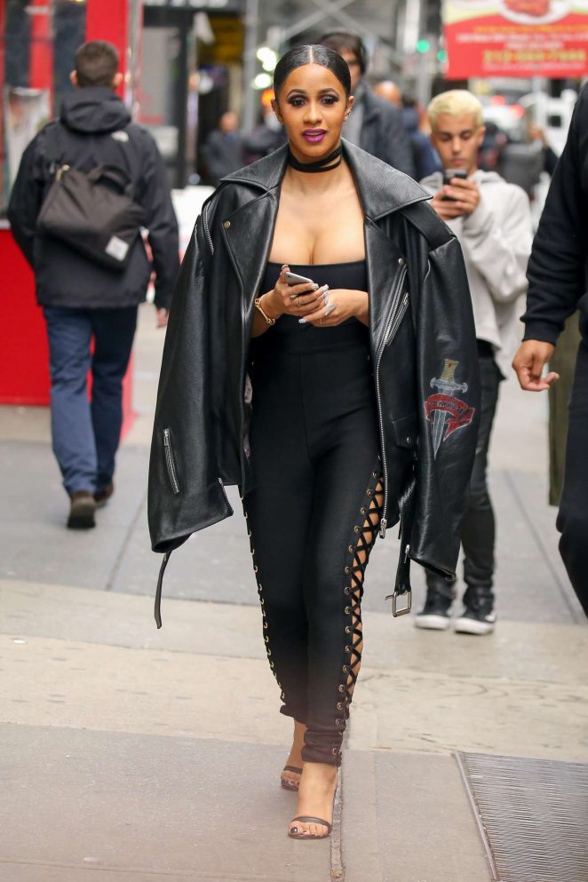 Cardi B in Black lace-up pants out in New York