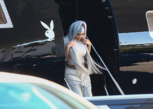 Cardi B - Rocks blue hair as she arrives in Miami