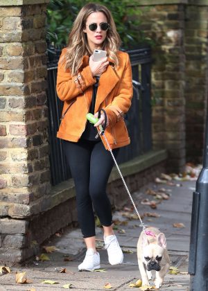 Caroline Flack with her dog out in London