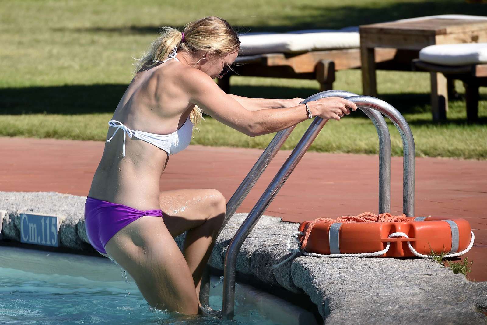 Caroline Wozniacki in Bikini at a pool in in Italy. 