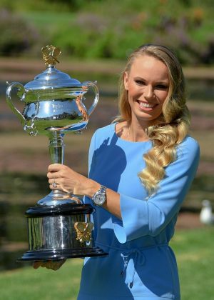Caroline Wozniacki - Poses with her trophy at the Botanical Gardens in Melbourne