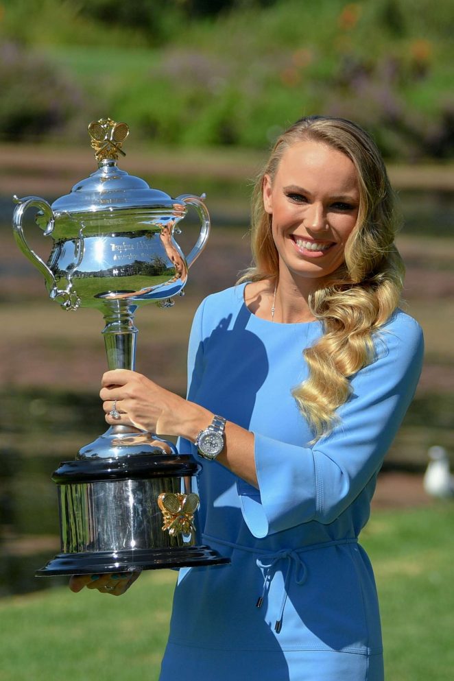 Caroline Wozniacki - Poses with her trophy at the Botanical Gardens in Melbourne