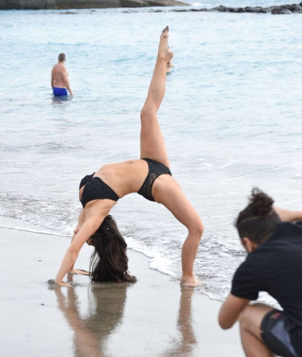 Casey Batchelor - In black bikini filming in Tenerife for her fitness app Yoga Blitz