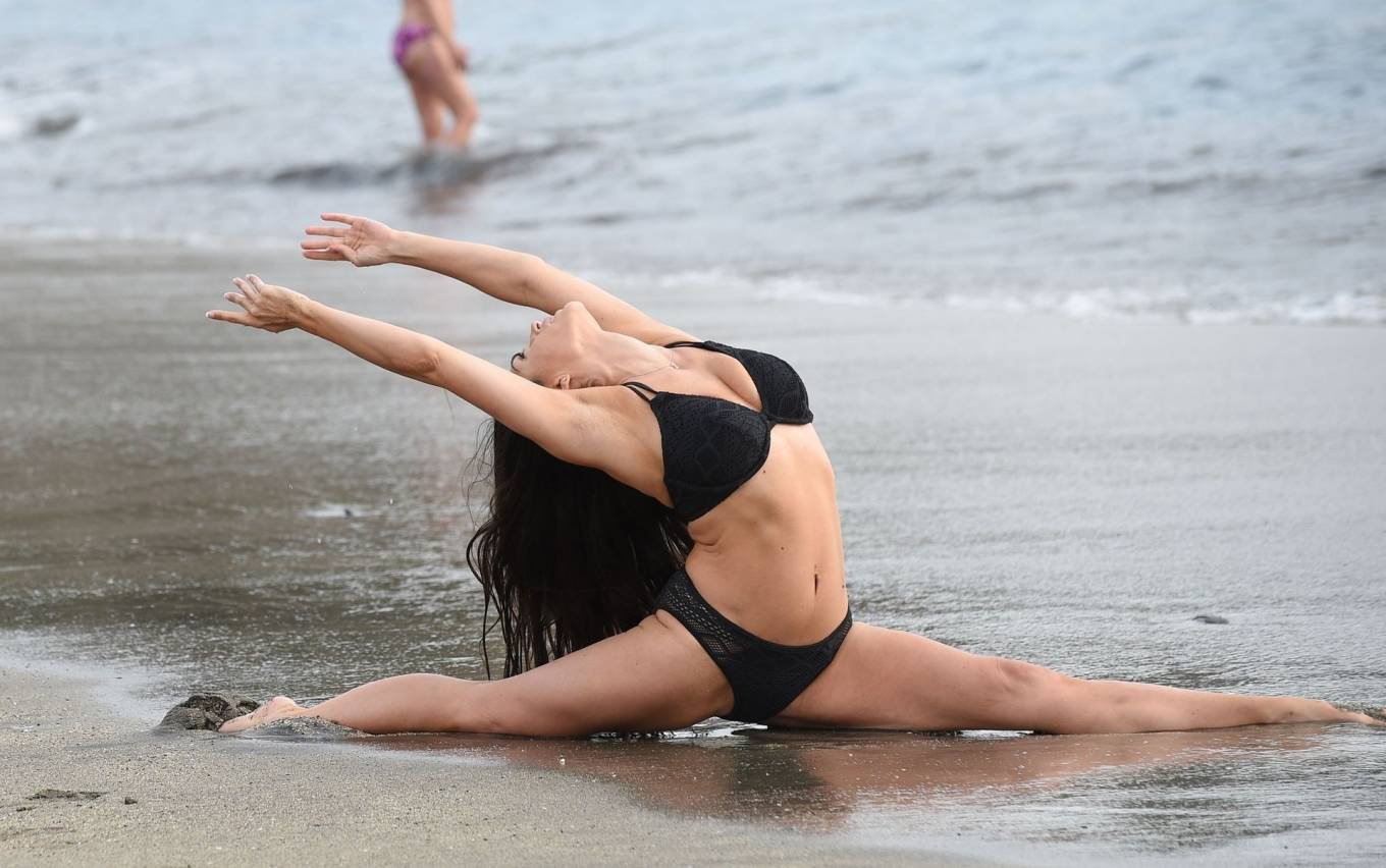 Casey Batchelor 2020 : Casey Batchelor – In black bikini filming in Tenerife for her fitness app Yoga Blitz-04