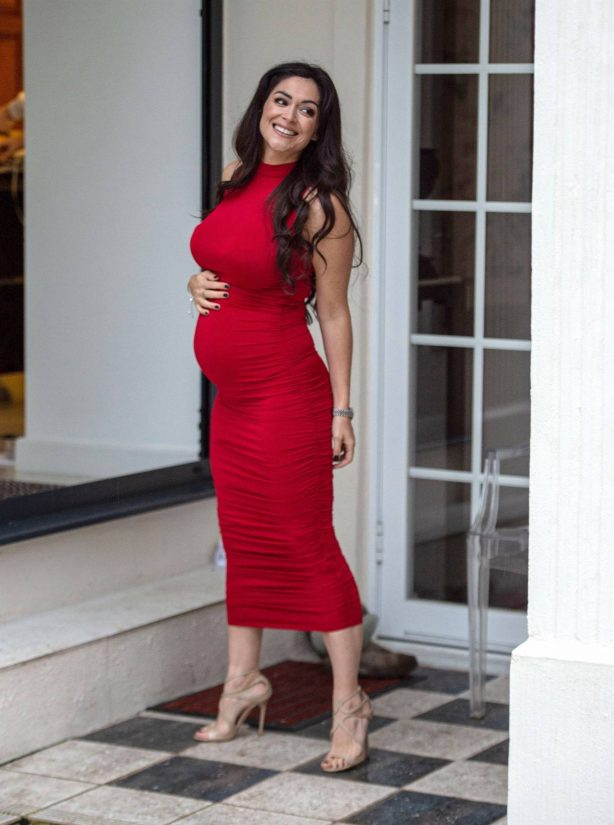 Casey Batchelor - Shows off her baby bump on a photoshoot in London