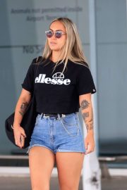 Cassie Lansdell in Jeans Shorts - Arrives in Adelaide