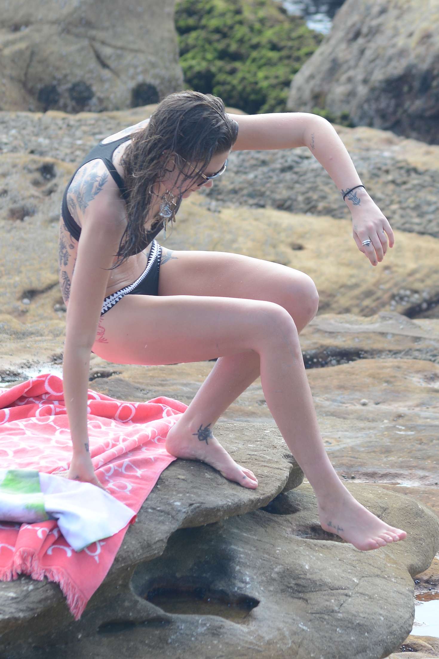 Catherine McNeil in Black Bikini in Bondi Beach. 