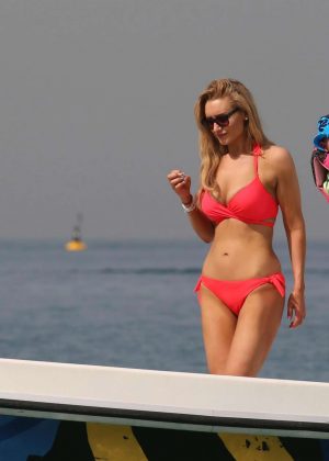 Catherine Tyldesley in Red Bikini on the beach in Dubai