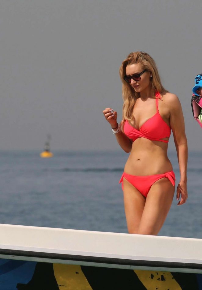 Catherine Tyldesley in Red Bikini on the beach in Dubai