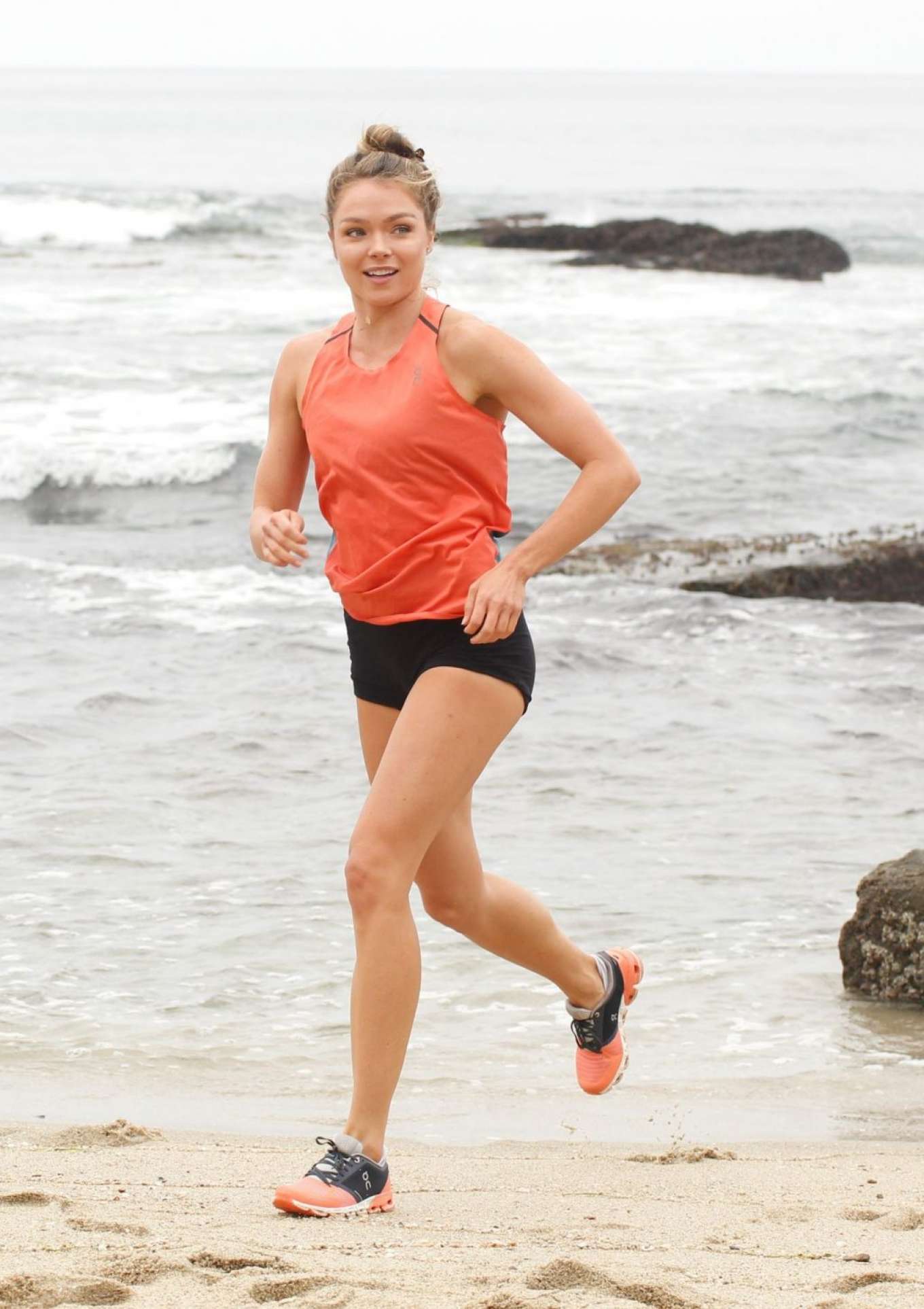 Chari Hawkins in Shorts â€“ Jogging on the beach in San Diego