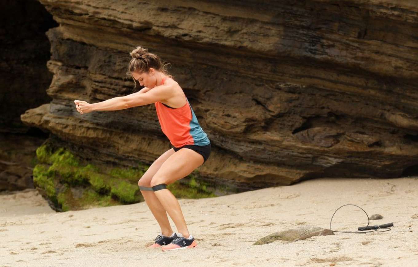 Chari Hawkins in Shorts â€“ Jogging on the beach in San Diego