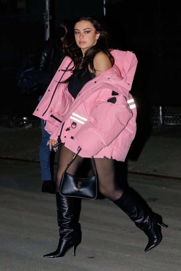 Charli XCX - In an oversized pink puffer at the YSL event at Avant Gardner