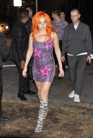 Charli XCX - Wearing a orange wig and knee high zebra pattern boots at Playboy party in Miami Beach