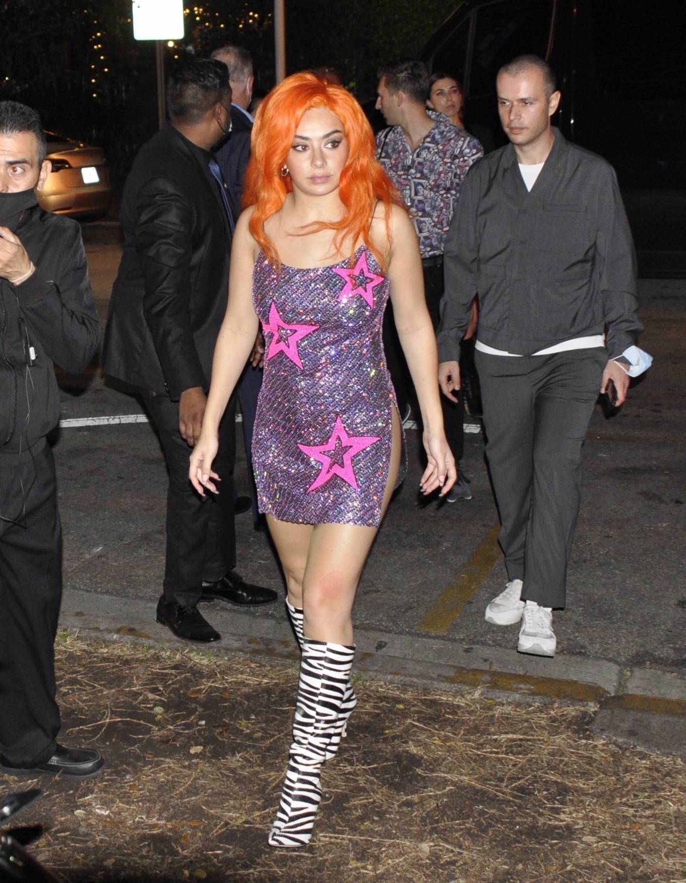 Charli XCX - Wearing a orange wig and knee high zebra pattern boots at Playboy party in Miami Beach