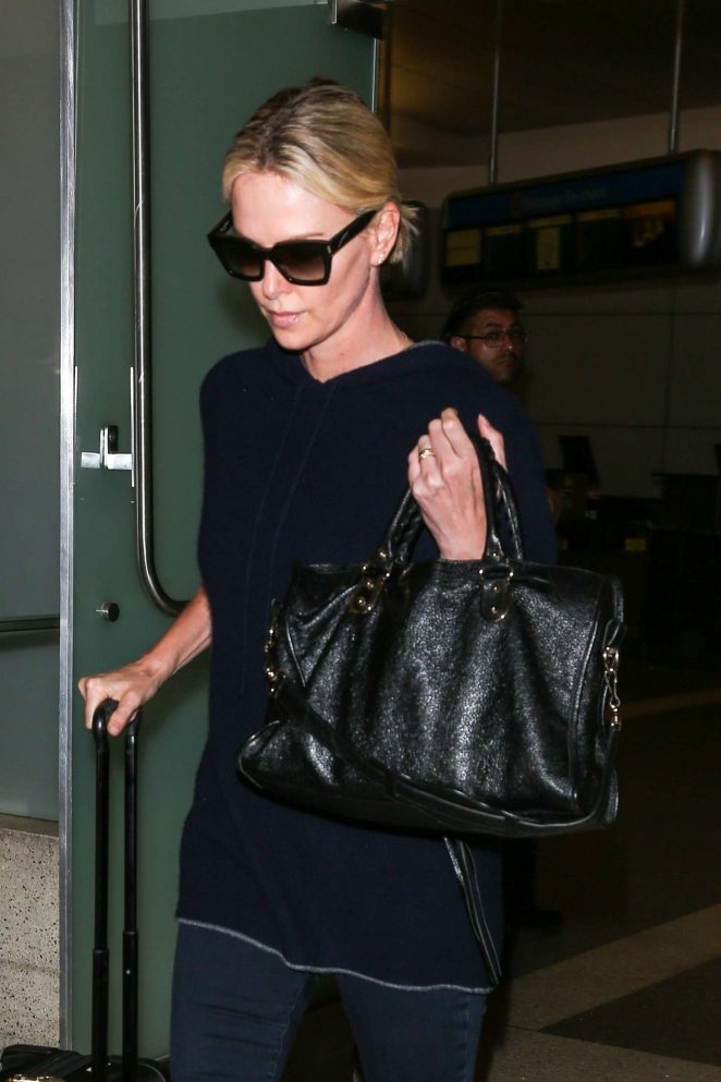 Charlize Theron - Arriving at LAX Airport in Los Angeles