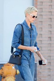 Charlize Theron - In denim jumpsuit out in Los Angeles