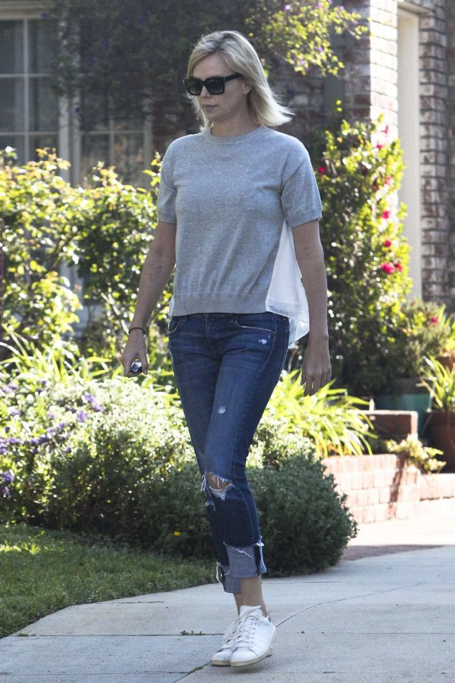 Charlize Theron in Ripped Jeans out in Hollywood