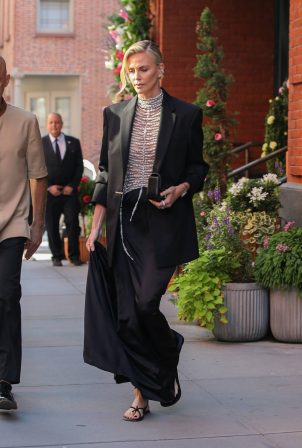Charlize Theron - Photographed wearing Dior ensemble while being in New York City