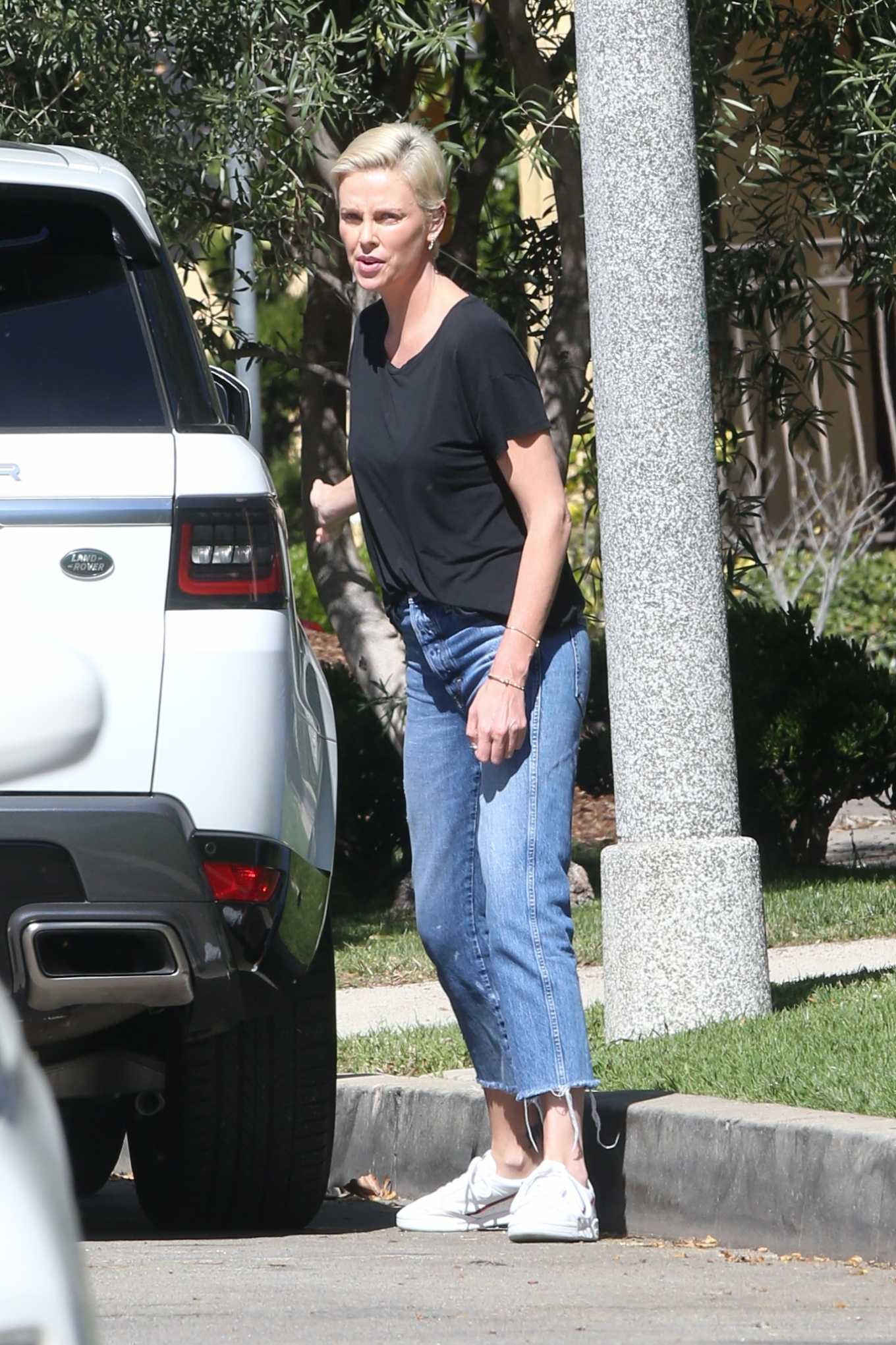 Charlize Theron picking up her kid in Los Angeles