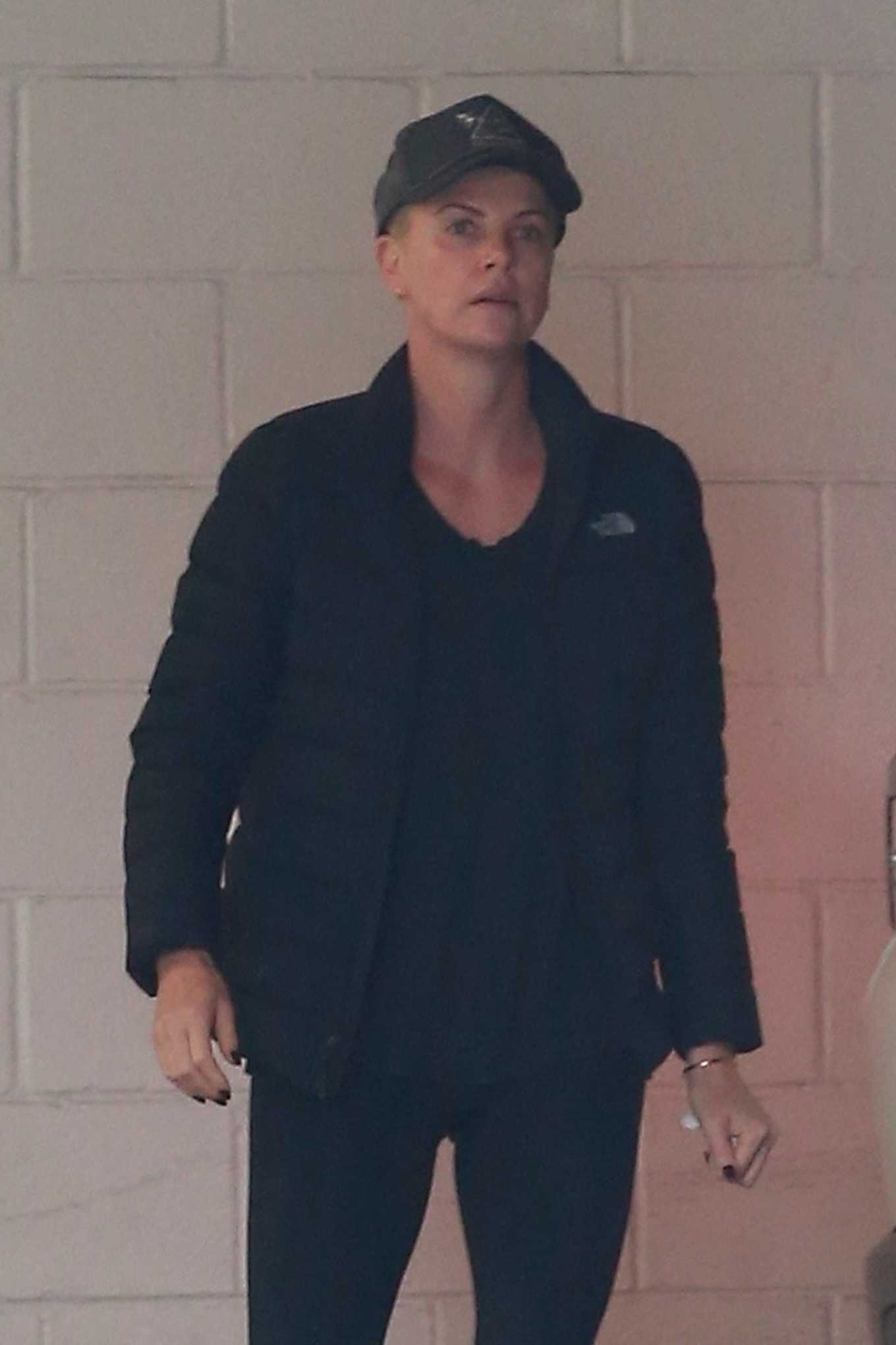 Charlize Theron â€“ Run errands in Beverly Hills