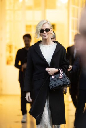 Charlize Theron - Seen at Dior boutique at Fashion Week in Paris