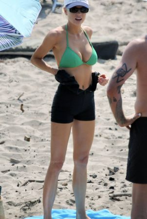 Charlotte McKinney - In a Green Bikini at the beach in Los Angeles