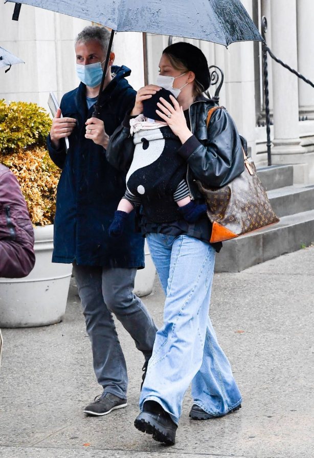 Chloë Sevigny - Cradles six-month-old baby boy Vanja in New York City