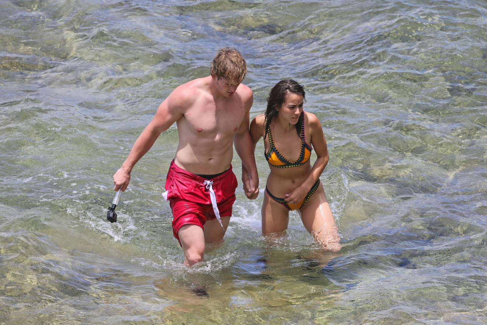Chloe Bennet in Bikini with boyfriend at the beach in Hawaii. 