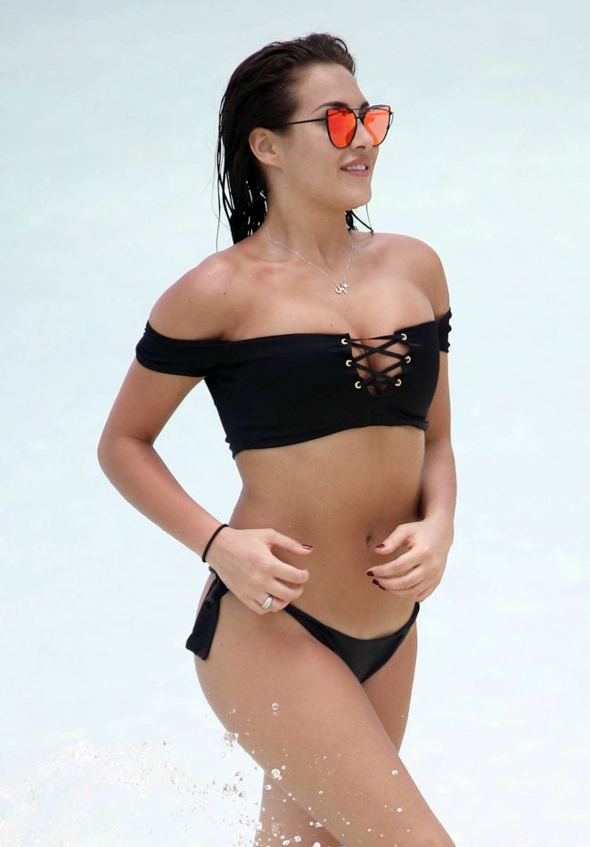 Chloe Goodman in Black Bikini on the beach in Dubai