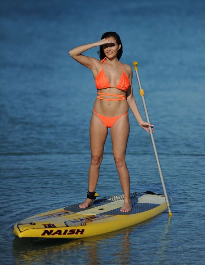Chloe Goodman in Orange Bikini Paddle boarding in Mexico