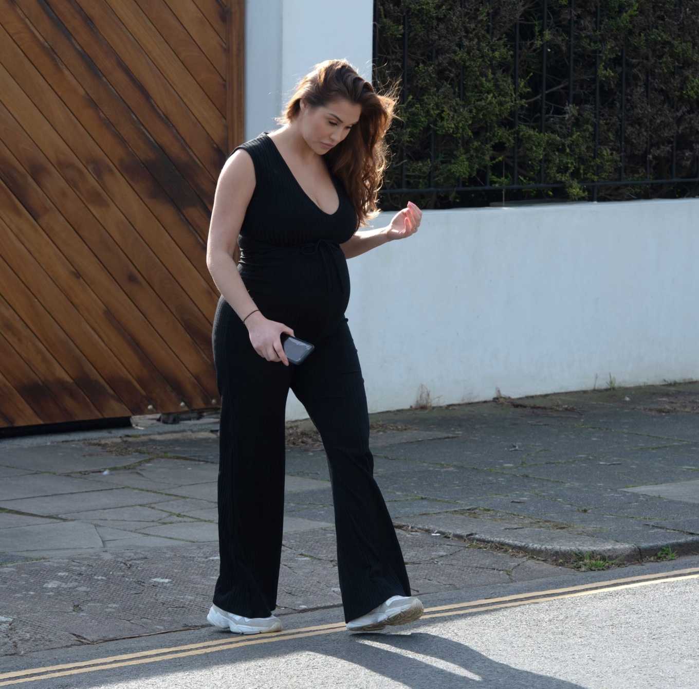 Chloe Goodman â€“ Showing baby bump while out for a morning walk at her home