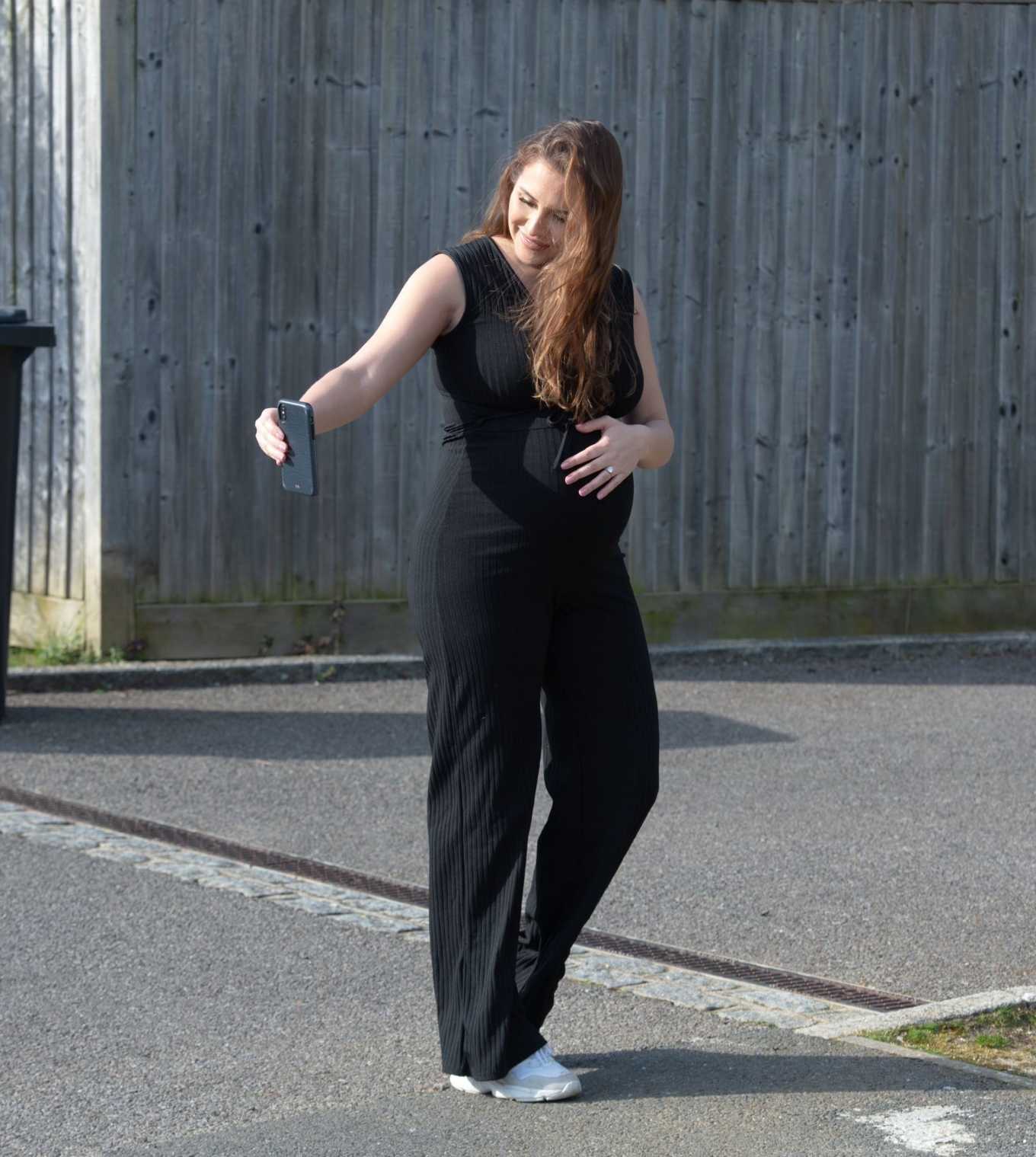 Chloe Goodman â€“ Showing baby bump while out for a morning walk at her home